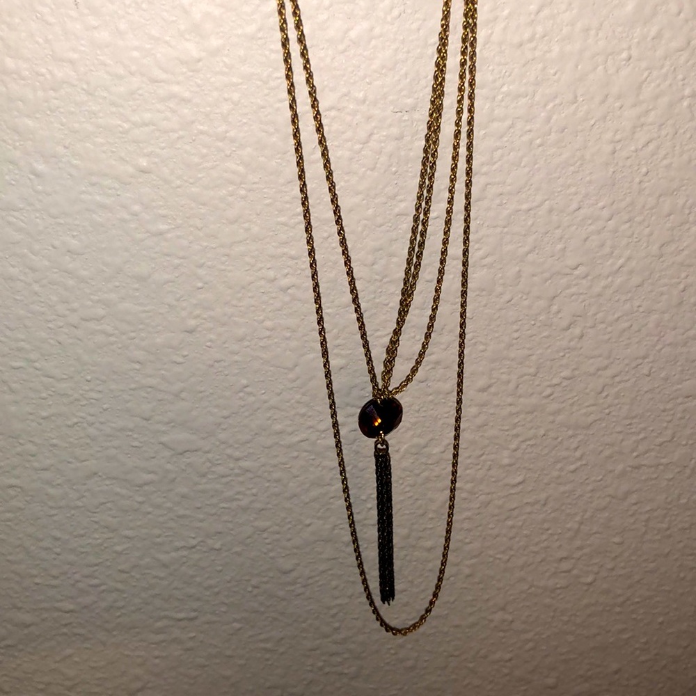 Alex and Ani gem starts at 16”, tassel ends at 23”